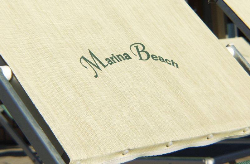 media.Scritta M.Beach su lettino